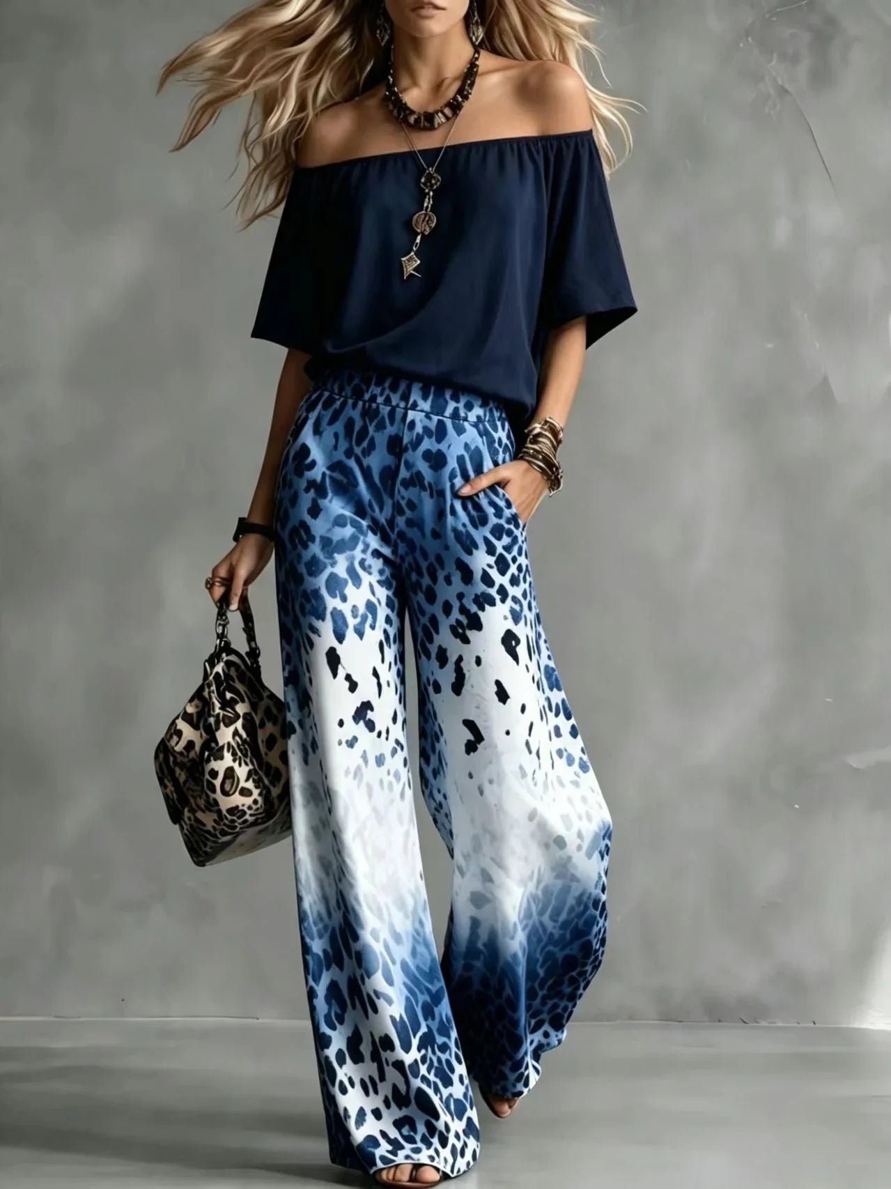 Rineia | Conjunto Elegante con Estampado Animal y Pernera Ancha